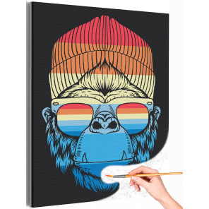 Красно-синяя обезьяна в шапке и очках / Животные Раскраска картина по номерам на холсте